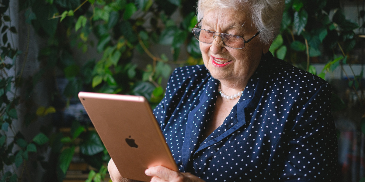 Elderly person using an Apple iPad for FaceTime