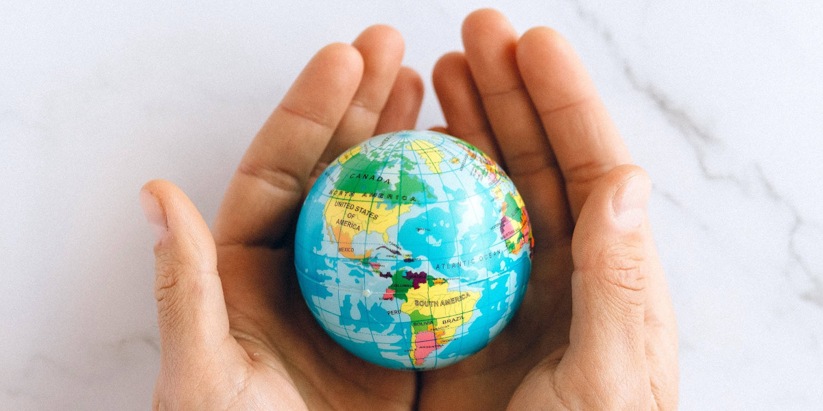 World globe held in hands